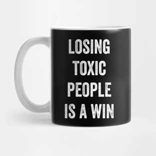 Losing Toxic People Is A Win Mug